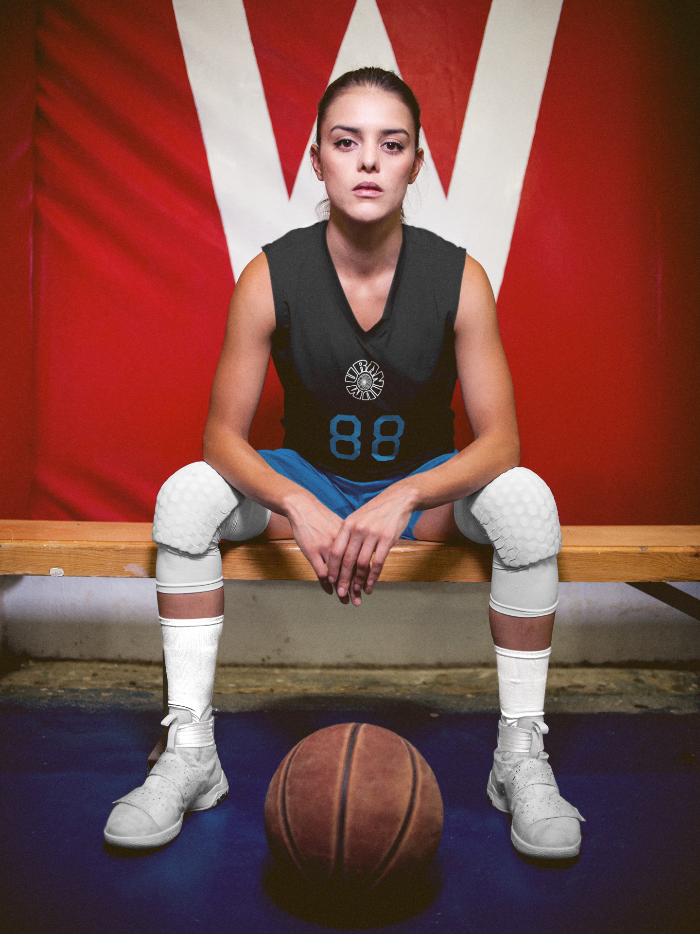 basketball-jersey-maker-woman-sitting-on-a-bench-a16706.png